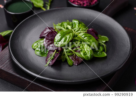 Delicious fresh salad consisting of spinach, chard, radicchio, red chart 99290919
