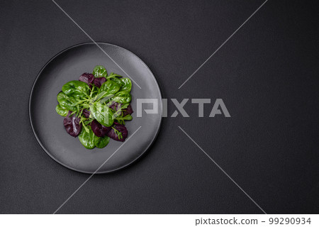 Delicious fresh salad consisting of spinach, chard, radicchio, red chart 99290934