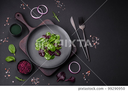 Delicious fresh salad consisting of spinach, chard, radicchio, red chart 99290950