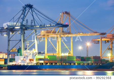 Cargo ship loading cargo container with crane at port. 99292368