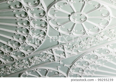 Ceiling design details in Gothic style. White gypsum bas-relief 99293239