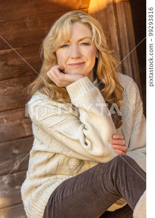 Attractive Thoughtful Middle Aged Woman Outside 99293816