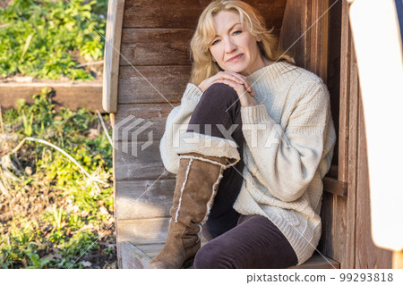 Attractive Thoughtful Middle Aged Woman Outside Attractive Thoughtful Middle Aged Woman Outside 99293818