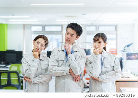 Worker thinking in the office 99296319