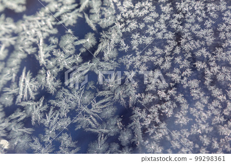 Frost crystals on the windshield Wiper marks 99298361