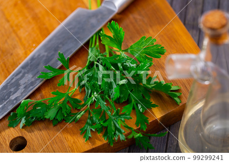 Fresh parsley on a wooden surface 99299241