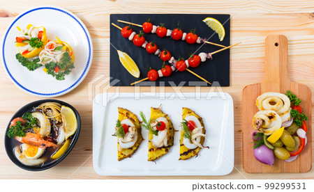 Dishes with squid and sepia Dishes with squid and sepia 99299531