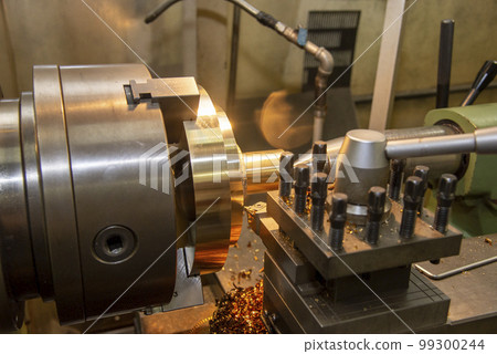 The lathe machine finish cut the brass parts by lathe tools. 99300244