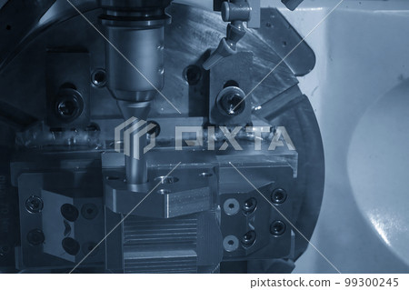 The 5-axis CNC milling machine hole cutting on the metal part. The 5-axis CNC milling machine hole cutting on the metal part. 99300245