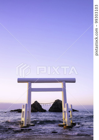 Beautiful Futamigaura white torii gate and Meotoiwa Rocks at sunset (Itoshima City, Fukuoka Prefecture) 99303103