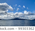 Contrast of clouds, sky, sea and mountains 99303362