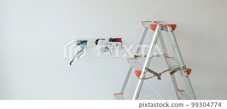 Ladder at construction site building. Renovation, Repair and development of home and apartment concepts 99304774