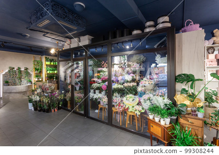 Flowers shop interior with cold storage for flowers demonstrating and saving. 99308244