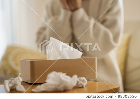 Women suffering from hay fever and colds 99308550