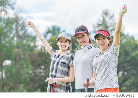 Golfer woman giving golf lesson at golf course 99309458