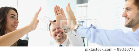 Overjoyed team of employees gives five celebrating success 99310775