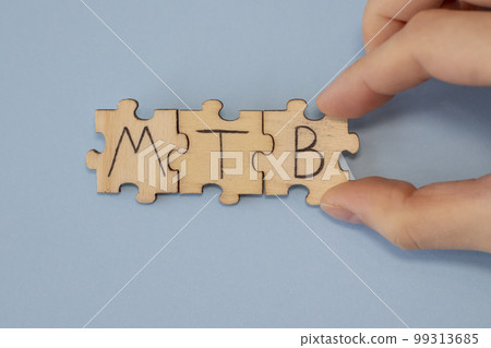 MTB acronym word written on wooden puzzles mycobacterium tuberculosis on a blue background 99313685