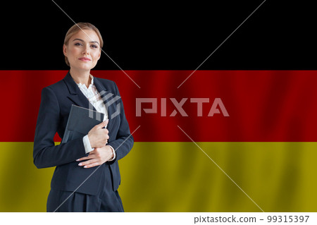 Deustch businesswoman on the flag of Germany Digital nomad, business, startup concept 99315397