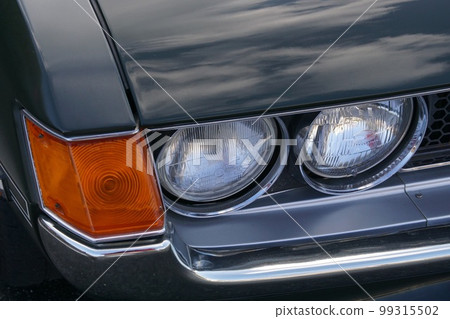 Rare classic car headlight closeup Rare classic car headlight closeup 99315502