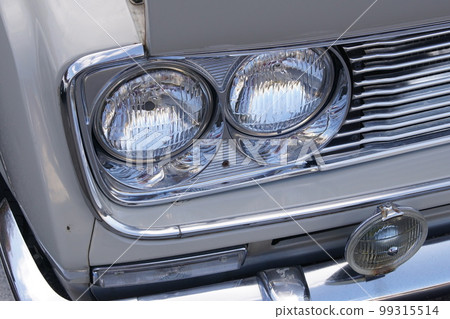 Rare classic car headlight closeup 99315514