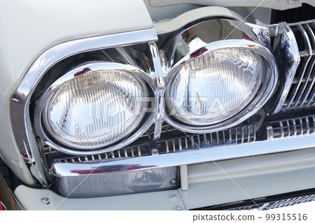 Rare classic car headlight closeup Rare classic car headlight closeup 99315516