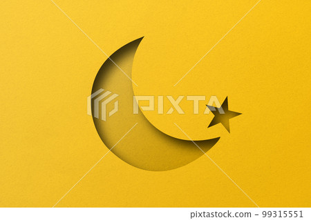 yellow paper cut into holes The crescent moon is overlaid with light and shadow. 99315551