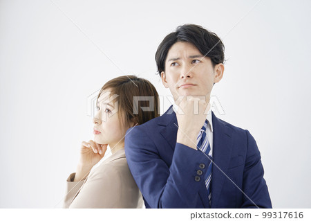 Thinking business woman and businessman white background Thinking business woman and businessman white background 99317616