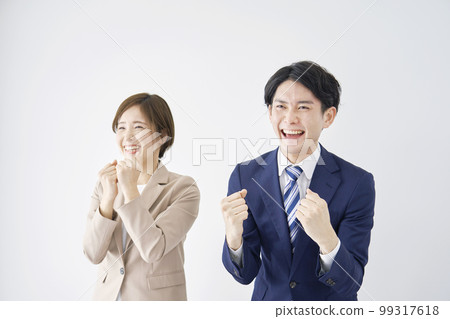 Business woman and businessman to pose in guts 99317618