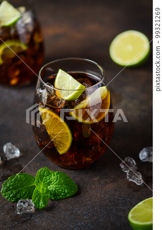 Cuba Libre with brown rum, cola and lime. Cuba Libre or long island cocktail. 99321269