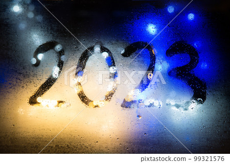 New year background of misted glass. 2023 numbers New year background of misted glass. 2023 numbers 99321576