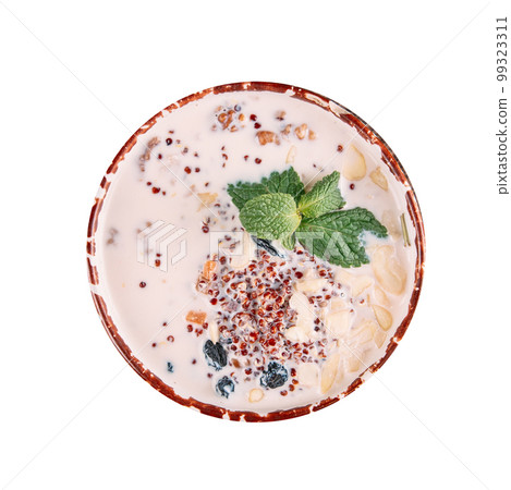 Portion of buckwheat porridge with milk and nuts  99323311