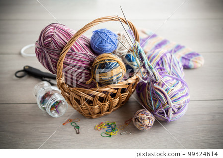 Colored threads, knitting needles and other items for hand knitting Colored threads, knitting needles and other items for hand knitting 99324614