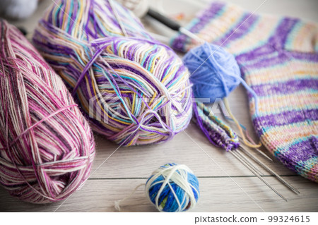 Colored threads, knitting needles and other items for hand knitting Colored threads, knitting needles and other items for hand knitting 99324615