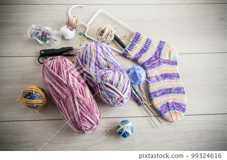 Colored threads, knitting needles and other items for hand knitting Colored threads, knitting needles and other items for hand knitting 99324616