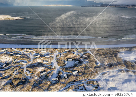 Aerial view of snow covered Portnoo in County Donegal, Ireland. Aerial view of snow covered Portnoo in County Donegal, Ireland. 99325764