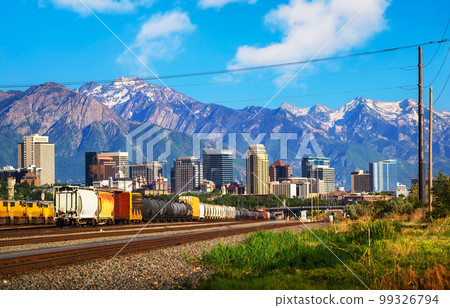Skyline of Salt Lake City downtown in Utah with Wasatch Range Mountains 99326794