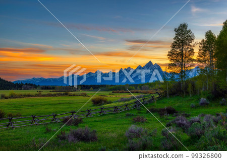 Colorful sunset above the Grand Teton mountains in Wyoming Colorful sunset above the Grand Teton mountains in Wyoming 99326800