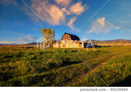 Sunset over John Moulton Barn at Mormon Row in Grand Teton National Park 99326804