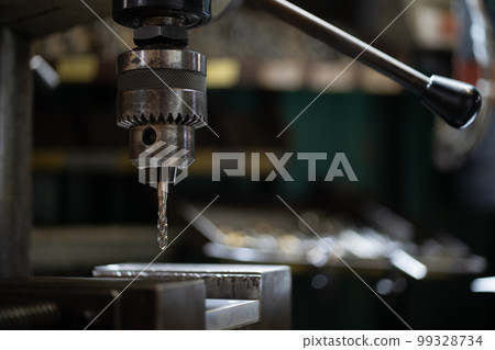 Threading with a Tapping Drilling Machine 99328734