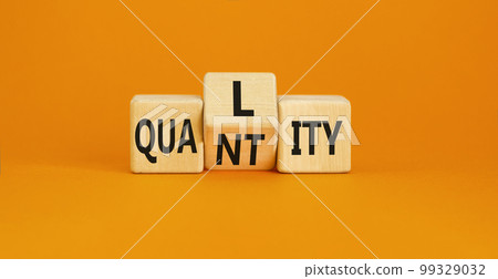 Quality and quantity symbol. Concept word Quality Quantity on wooden cubes. Beautiful orange table orange background. Business and quality and quantity concept. Copy space. 99329032