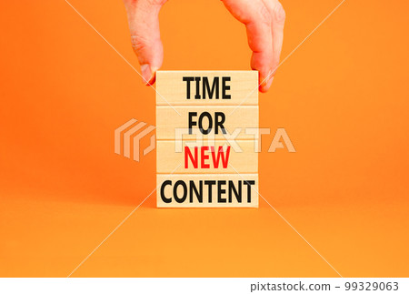 Time for new content symbol. Concept words Time for new content on wooden blocks. Beautiful orange table orange background. Businessman hand. Business time for new content concept. Copy space. 99329063