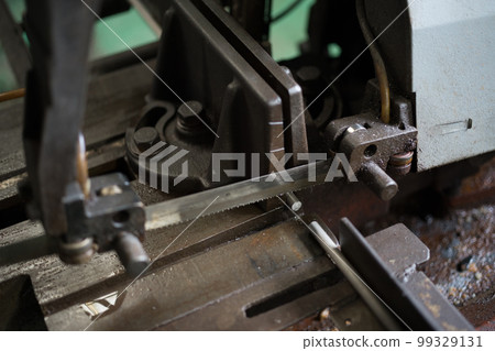 cutting material with band saw cutting material with band saw 99329131