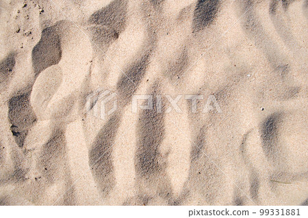 Flat view of clean yellow sand surface covering seaside beach. Sandy texture 99331881