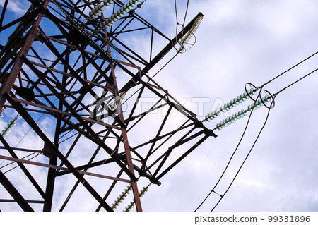Electric power lines divided by safe guard insulating frame transfening safely high voltage electrical energy through cable wires. Electricity transmission on long distance concept Electric power lines divided by safe guard insulating frame transfening safely high voltage electrical energy through cable wires. Electricity transmission on long distance concept 99331896