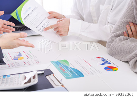 A couple considering insurance A couple considering insurance 99332365