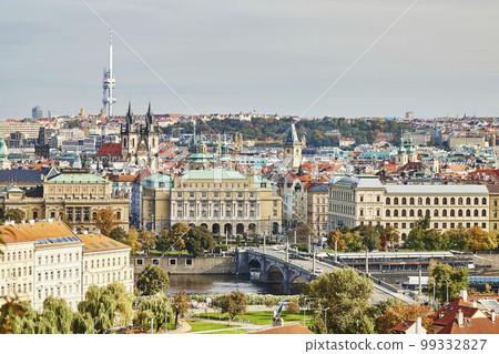 View of Vltava, bridge and Czech historical buildings in Prague. View of Vltava, bridge and Czech historical buildings in Prague. 99332827