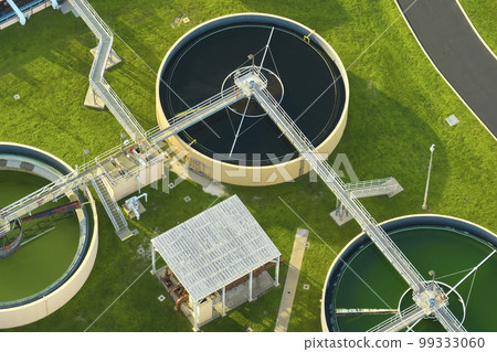 Aerial view of modern water cleaning facility at urban wastewater treatment plant. Purification process of removing undesirable chemicals, suspended solids and gases from contaminated liquid 99333060