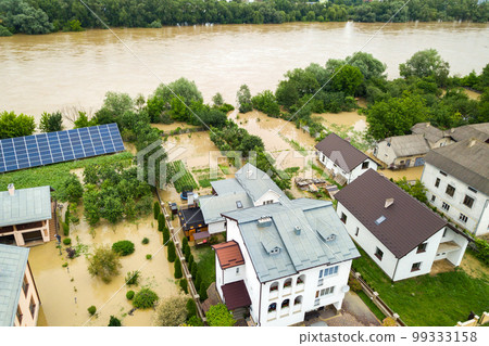 Aerial view of flooded houses with dirty water of Dnister river in Halych town, western Ukraine. 99333158