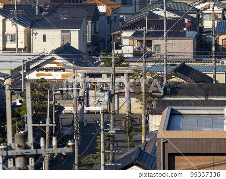 Scenery with torii gates in the city Scenery with torii gates in the city 99337336