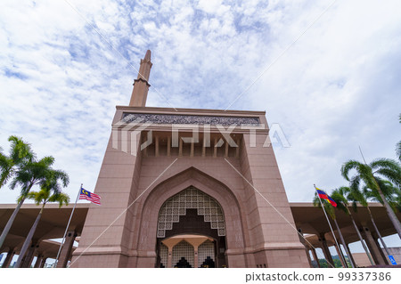 Pink Mosque (Masjid Putra) front gate and minaret in Malaysia 99337386